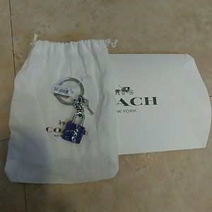 Coach purple lock key chain